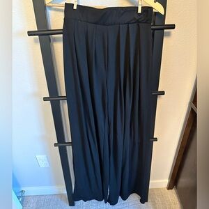 Black flowy soft pant. 32” long, 12.25” at waist. Extremely soft and flowy.